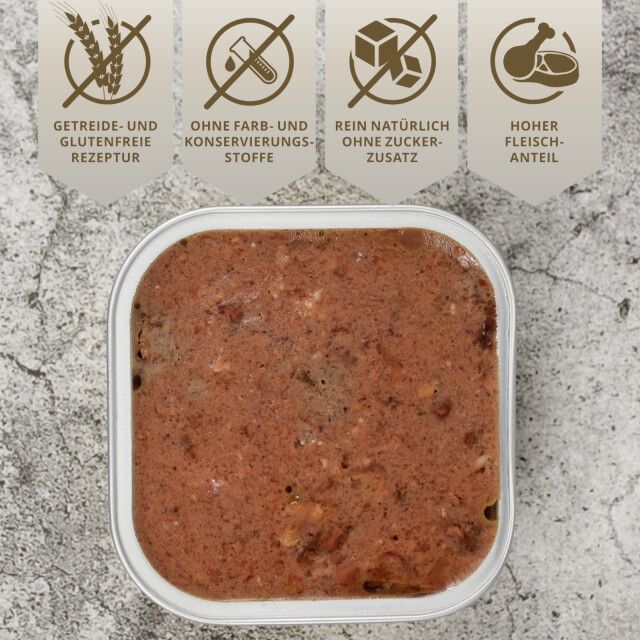 Hundefutter in einer Dose. Symbole: Getreidefrei, ohne Farb- und Konservierungsstoffe, ohne Zuckerzusatz, hoher Fleischanteil.