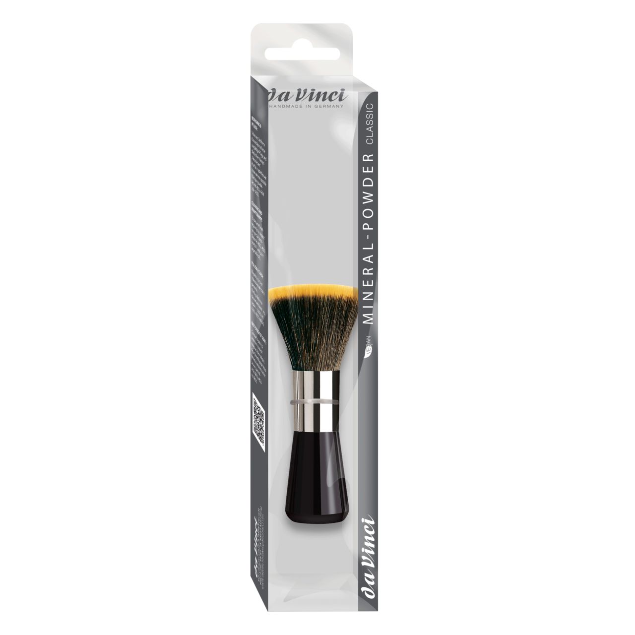 Puderpinsel in Verpackung. Schwarzer Griff, silberne Zwinge, gelb-schwarze Borsten. Verpackung mit Da Vinci-Logo und Produktbezeichnung.