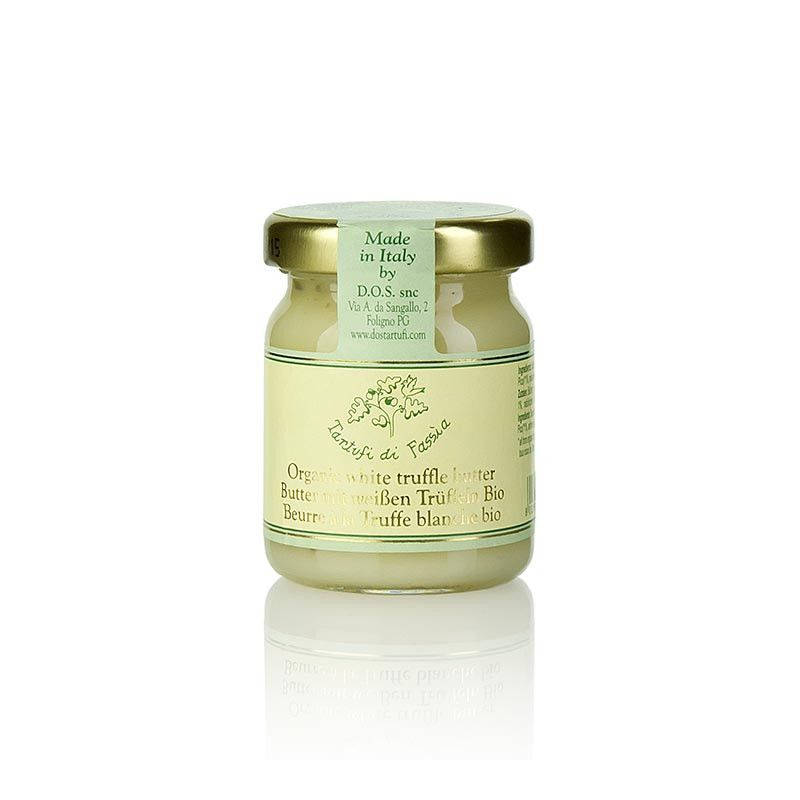 Glas mit weißer Trüffelbutter. Etikett mit Schriftzug „Made in Italy“ und „Tartufi di Fassia“. Bio-Zertifizierung.