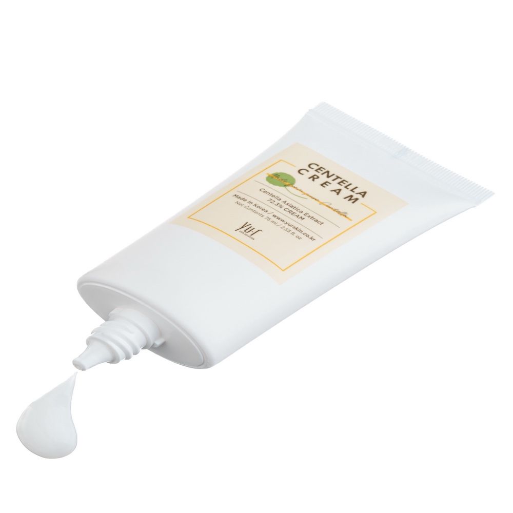 Creme-Tube mit Aufschrift Centella Cream, Centella Asiatica Extract 72.3% CREAM. Creme wird herausgedrückt.