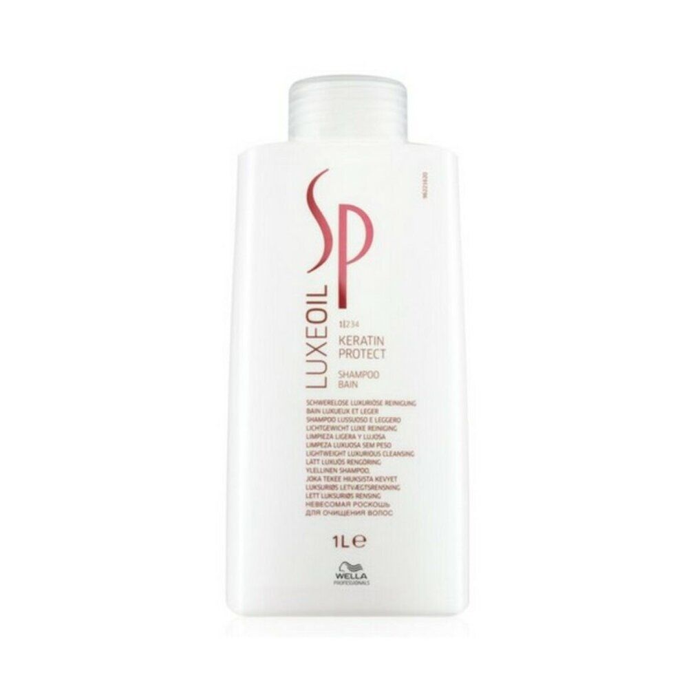 Weiße Shampoo-Flasche mit braunem Logo und Schriftzug. Enthält "LUXE OIL", "KERATIN PROTECT SHAMPOO". Marke: Wella Professionals. 1L.