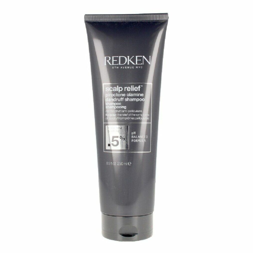 Dunkelgraue Tube. Text: Redken, Scalp Relief, Piroctone Olamine, Anti-Schuppen Shampoo. 0,5% Piroctone Olamine.
