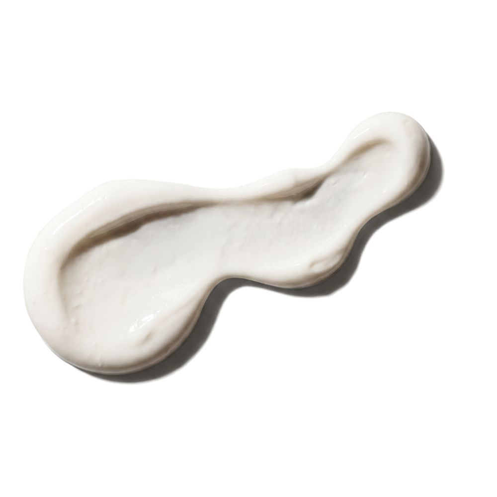 Eine weiße Creme-Textur auf weißem Hintergrund.