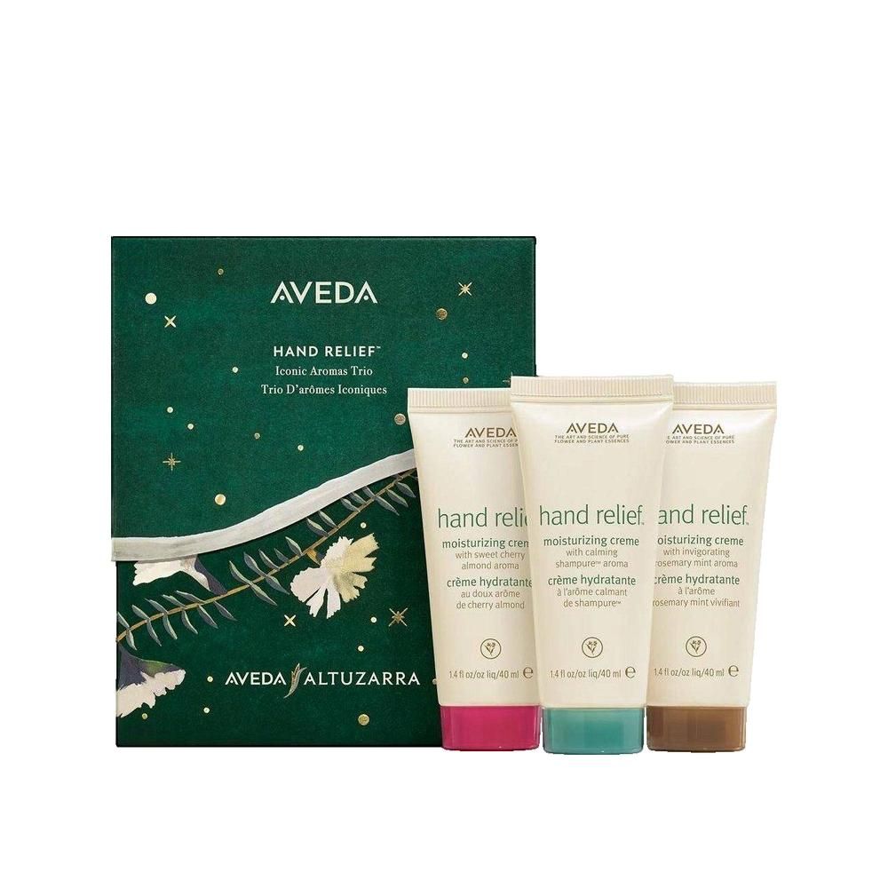 Geschenkset mit drei Handcremes und einer Schachtel. Cremes in Rosa, Türkis und Braun. Text: Aveda Hand Relief.