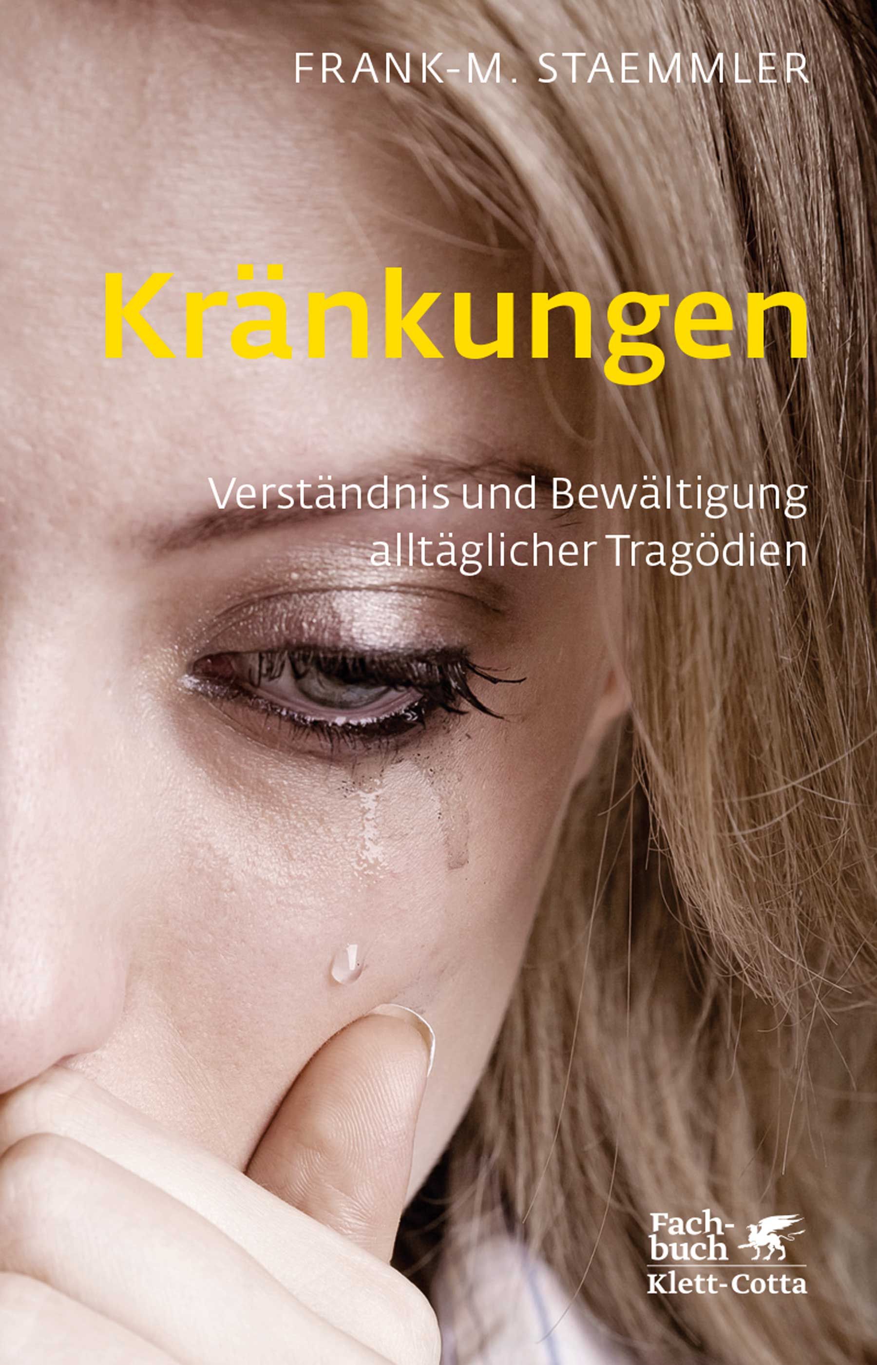 Buchcover mit Titel "Kränkungen". Gesicht einer weinenden Frau. Autor: Frank-M. Staemmler. Verlag: Klett-Cotta.