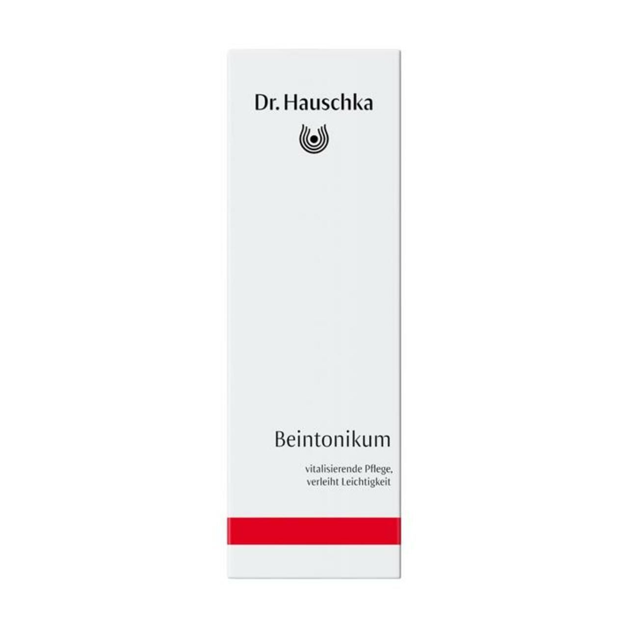 Verpackung mit Produktnamen und Marke Dr. Hauschka. Roter Streifen. Text: vitalisierende Pflege, verleiht Leichtigkeit.