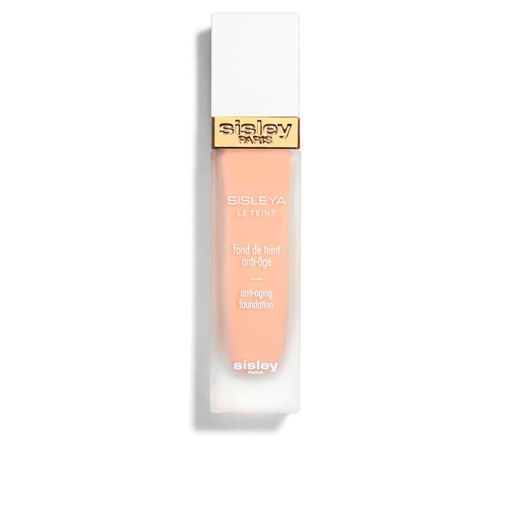 Sisley Le Teint Anti-Âge Foundation. Flakon mit weißem Deckel und goldfarbenem Schriftzug. Produktname und Text auf dem Flakon.