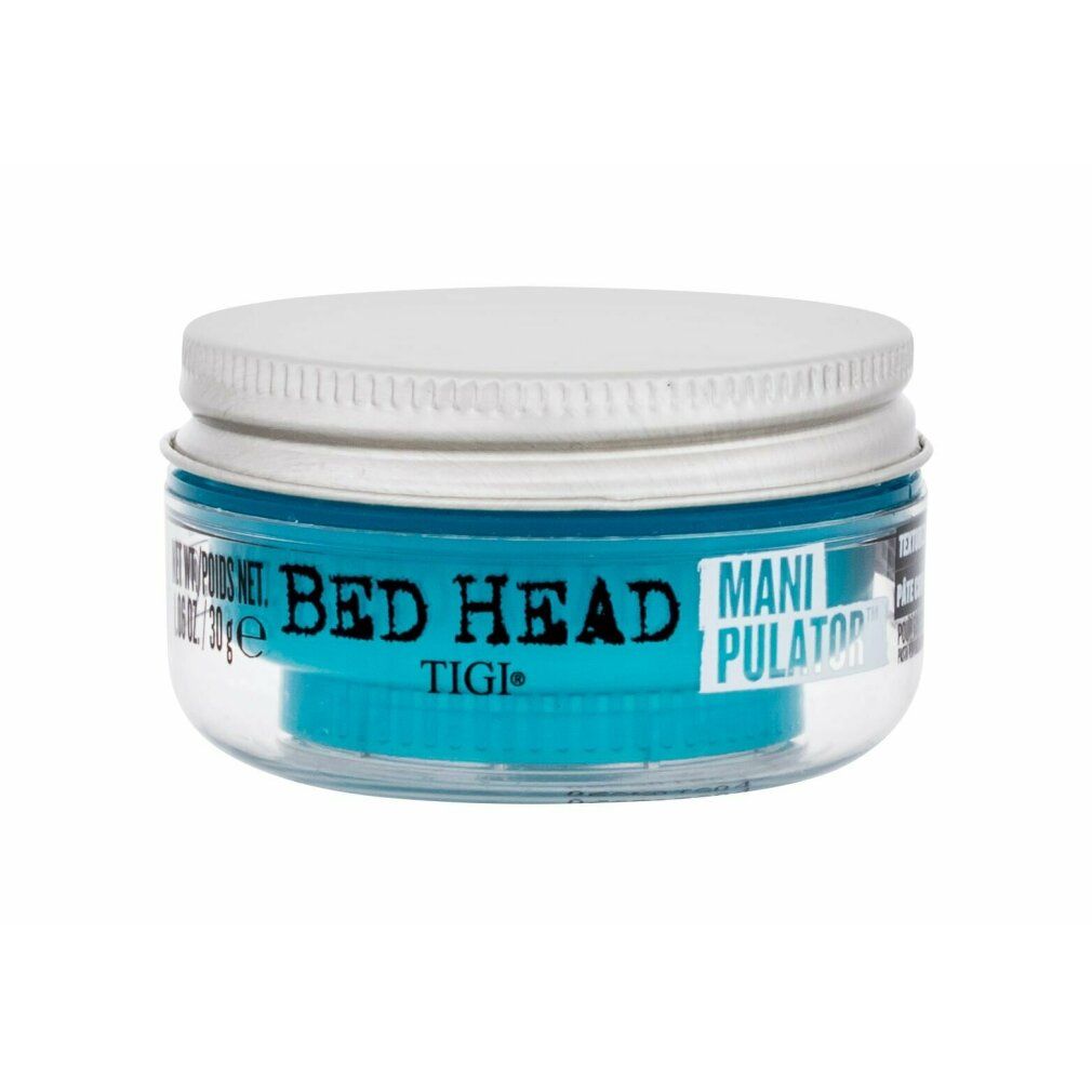 Runde, transparente Dose mit weißem Deckel. Aufschrift "BED HEAD MANIPULATOR" und "TIGI". Inhalt: blau.