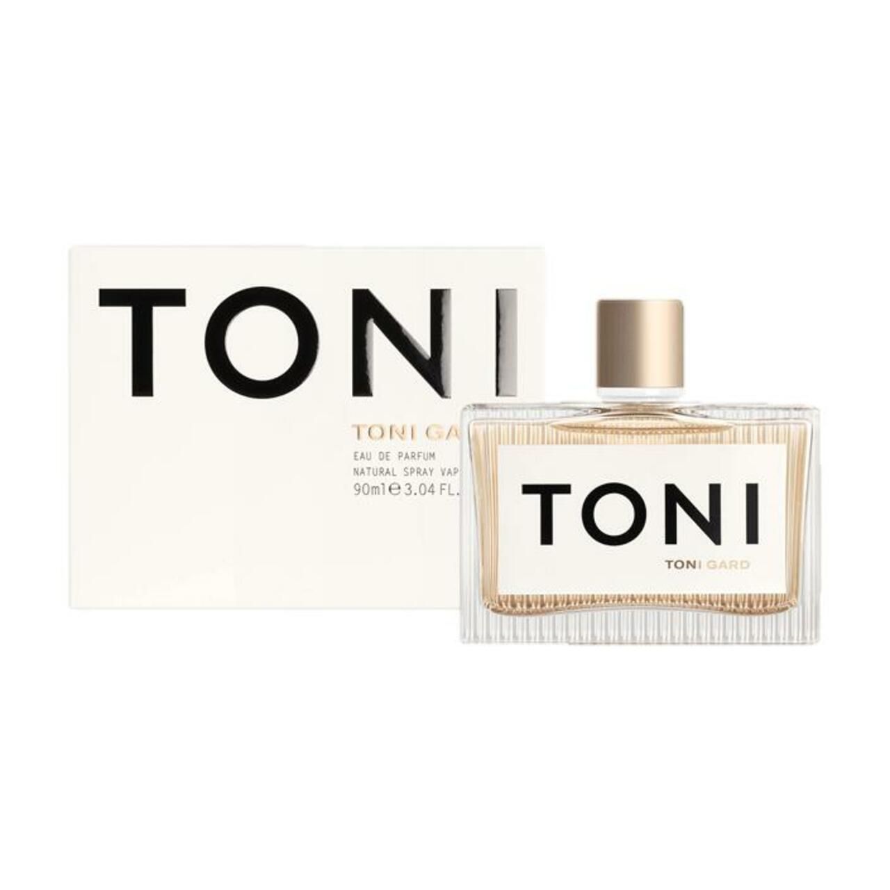 Parfümflakon und Verpackung. Flakon mit goldfarbenem Verschluss, rechteckig. Verpackung mit schwarzem Schriftzug TONI.