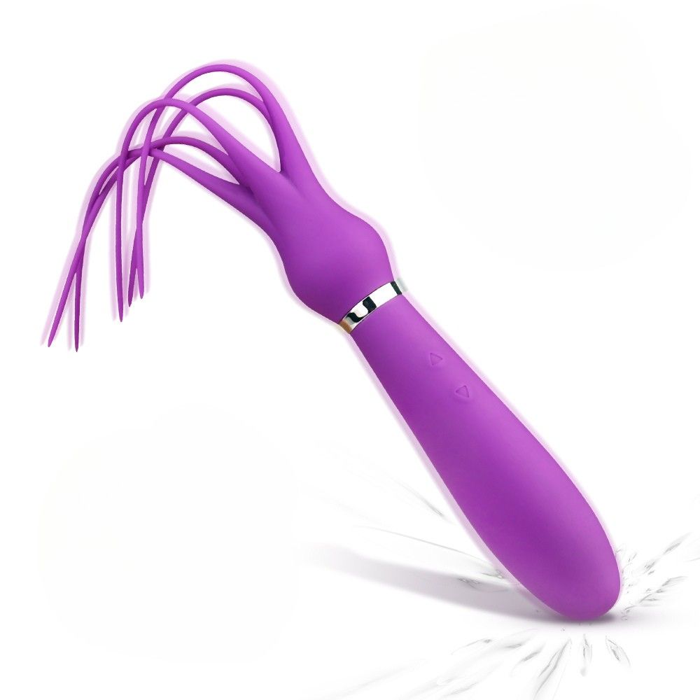 Lila Vibrator mit tentakelartigen Enden. Zylindrischer Griff, silberner Ring. Vier Tentakel. Aus Silikon.