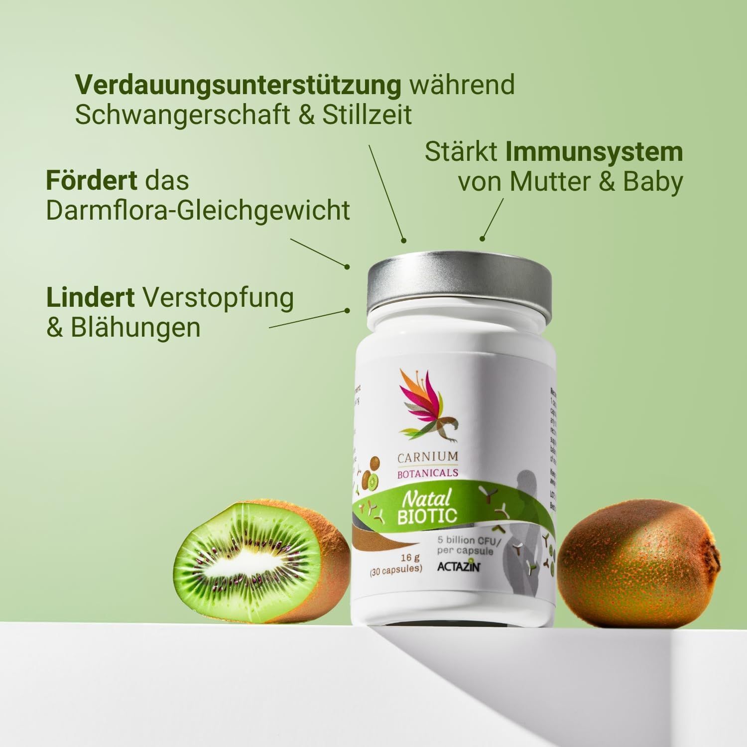 Weiße Flasche mit silbernem Deckel. Aufschrift: Carnium Botanicals Natal Biotic. Kiwis liegen daneben.
