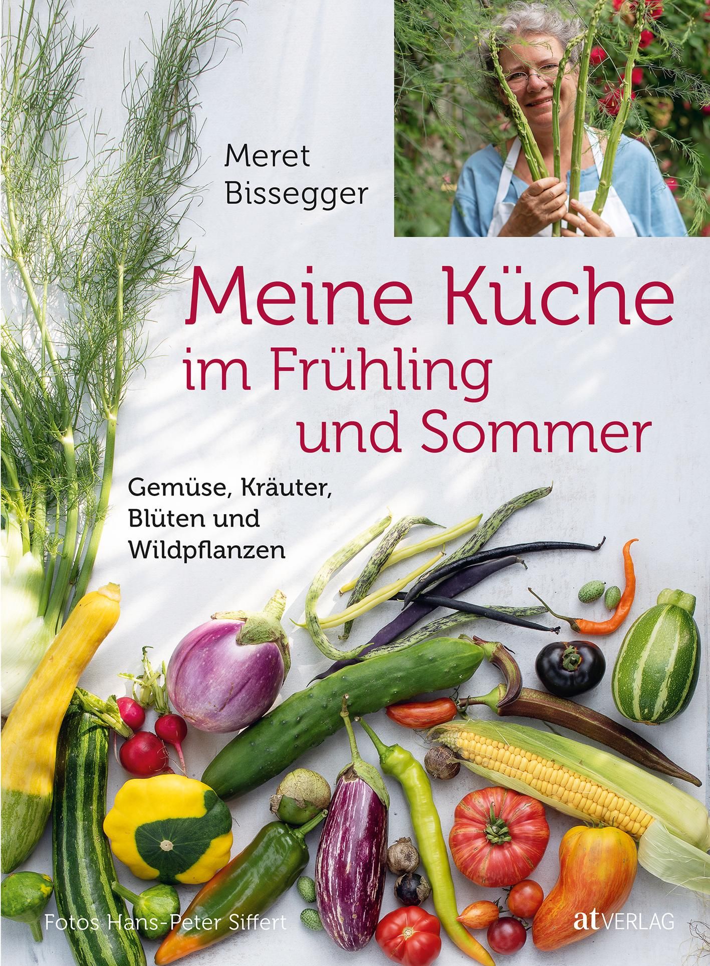 Buchcover mit dem Titel "Meine Küche im Frühling und Sommer". Gemüse, Kräuter und Blüten sind abgebildet. Autorin: Meret Bissegger.