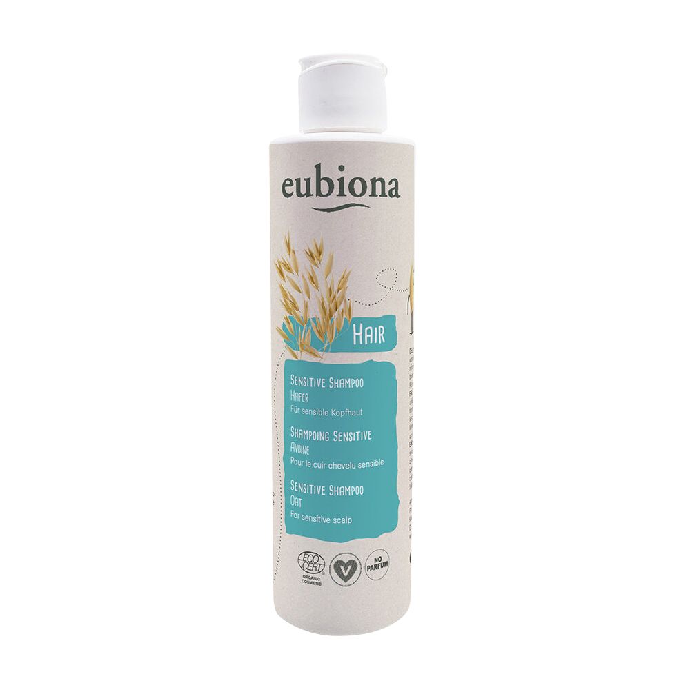Zylindrische Flasche mit weißem Klappverschluss. Aufschrift: eubiona, Hafer, Sensitive Shampoo. Mit Bio-Siegel und Herz-Symbol.
