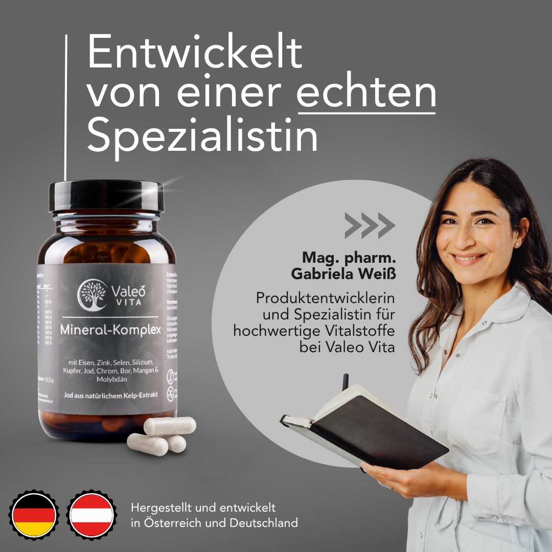 Braune Glasflasche mit schwarzen Deckel. Valeo Vita Mineral-Komplex. Daneben Kapseln. Frau mit Notizbuch. Text: Hergestellt in Österreich und Deutschland.