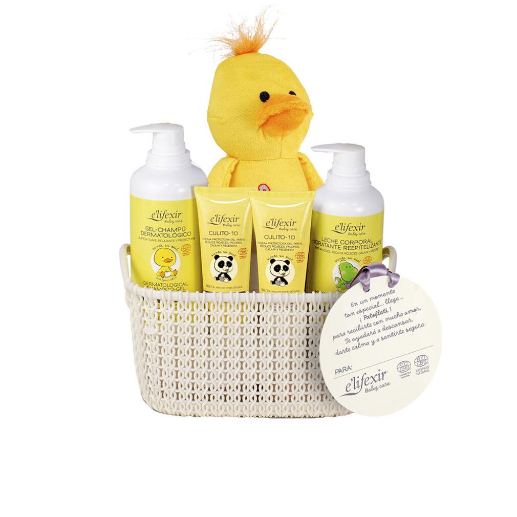 Baby-Pflegekorb mit Quietscheente, 2x Pumpspender, 2x Tuben und 2x kleine Flaschen.
