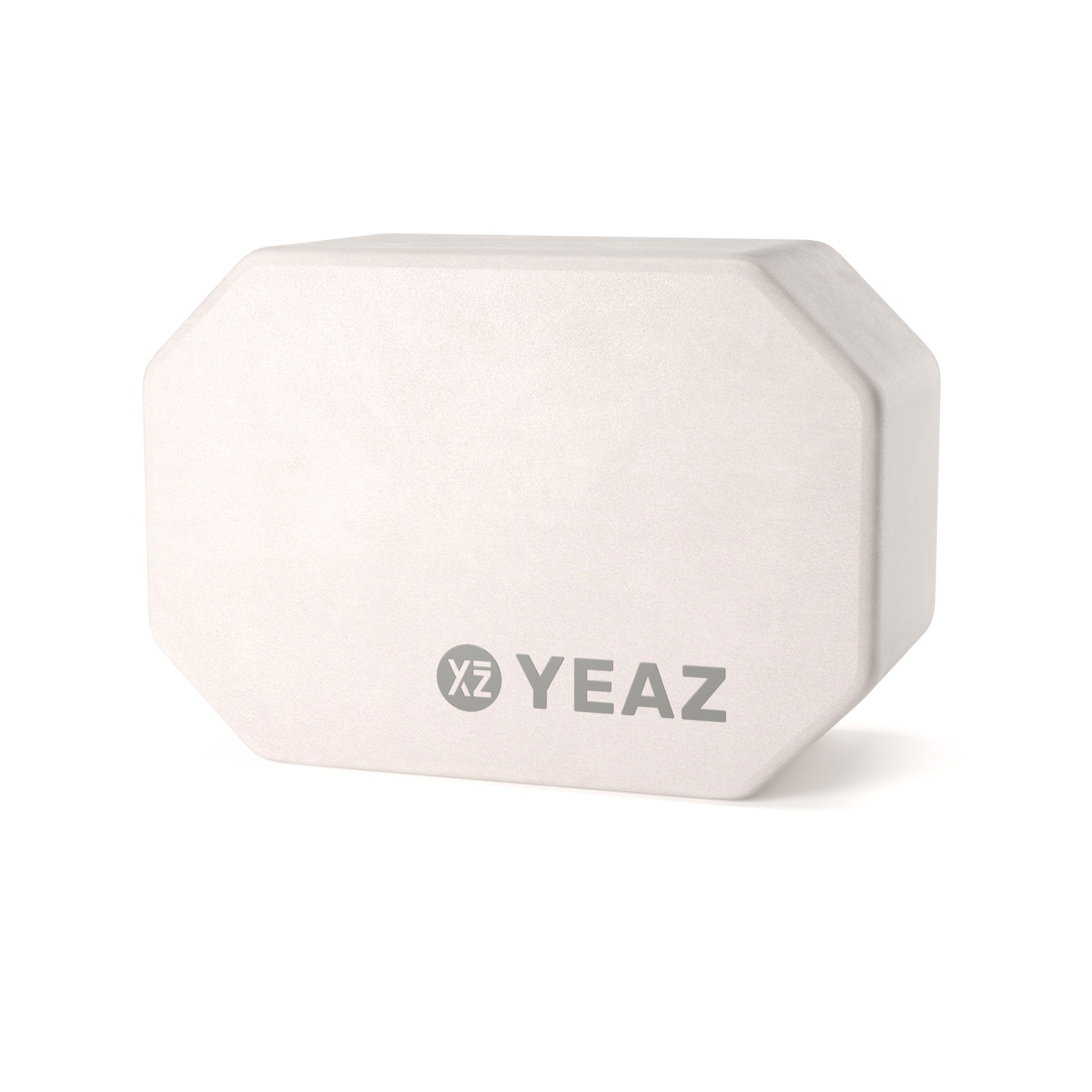 Weißer Yoga-Block mit dem Logo YEAZ. Der Block hat eine achteckige Form.