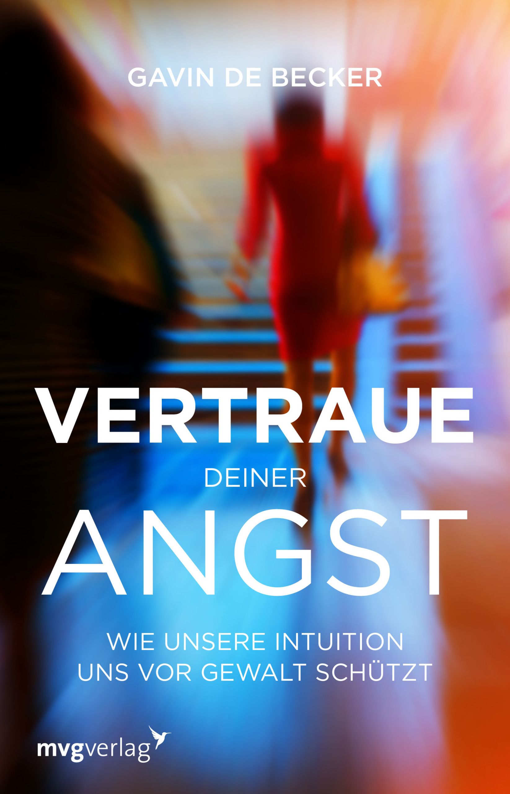 Buchcover: "Vertraue deiner Angst". Autor: Gavin de Becker. Titel in weißer Schrift. Hintergrund: verschwommene Person in Rot.