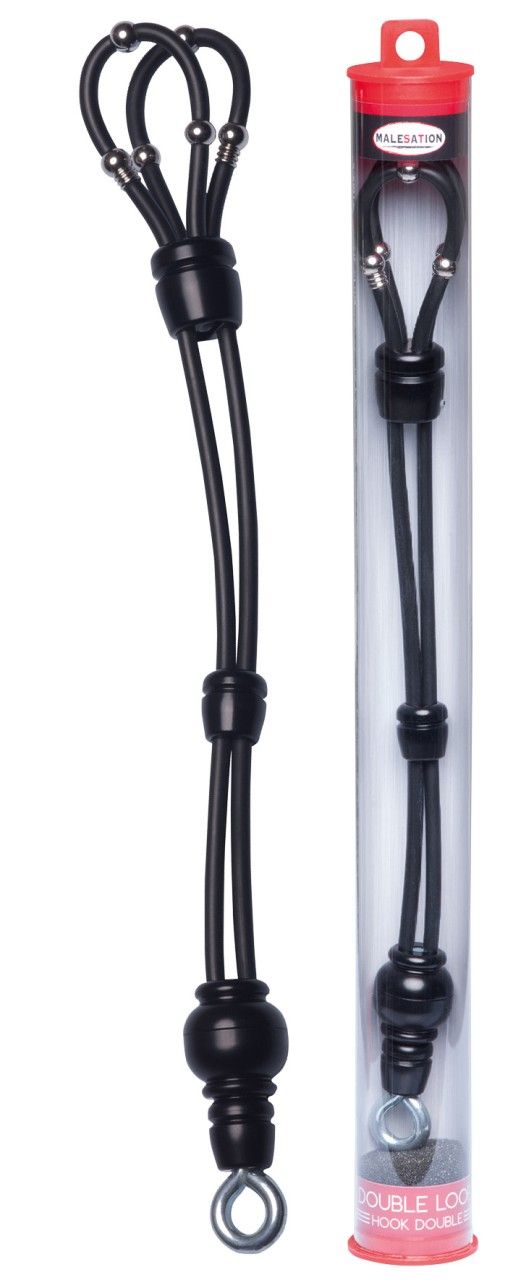 Schwarzes Produkt mit zwei Schlaufen, Kugeln und Haken, neben einer transparenten Röhre mit Produkt. Rote Kappe mit Text.