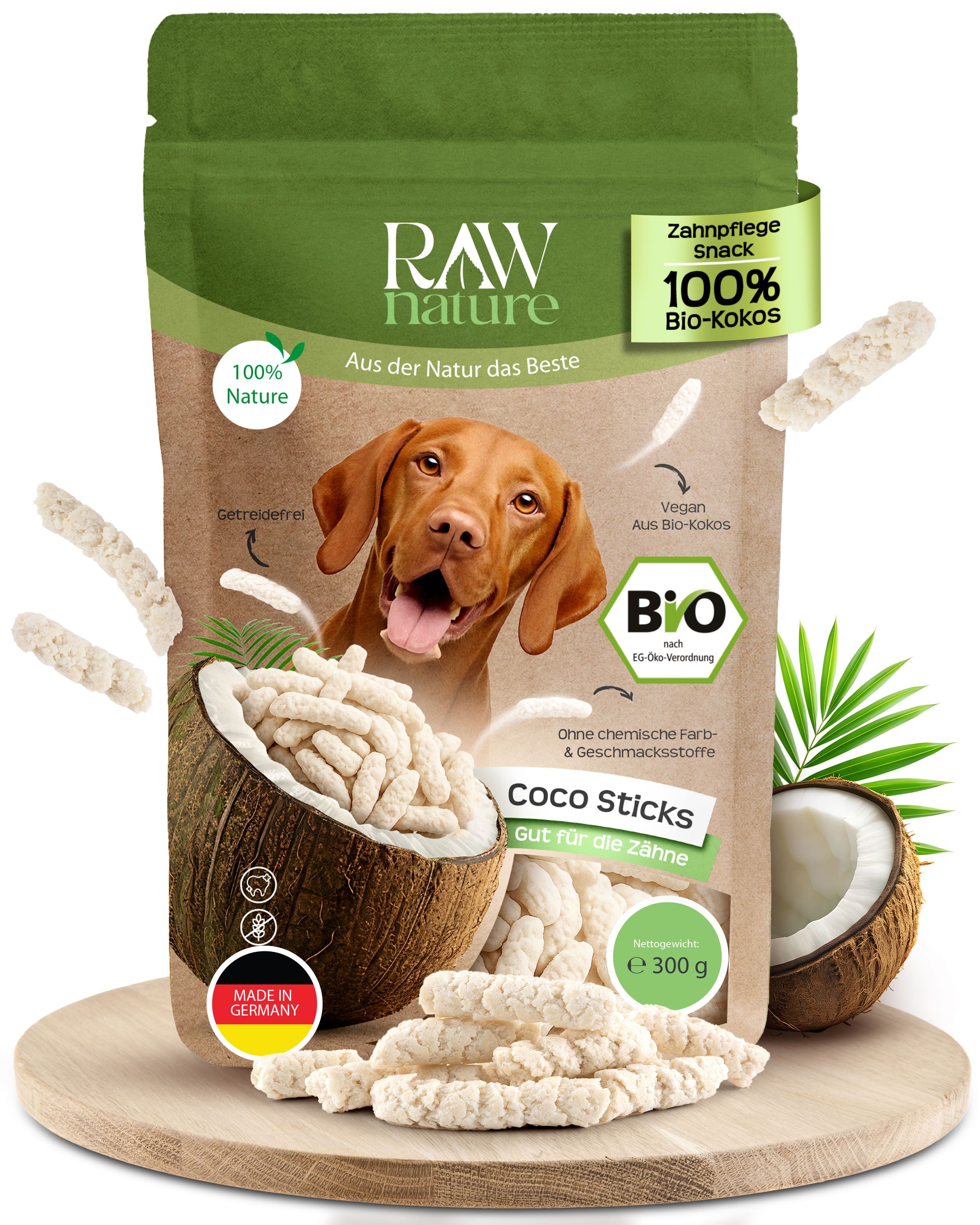 Verpackung mit Coco Sticks für Hunde. Enthält Kokosnuss, Hund und Sticks. Text: Zahnflege Snack, 100% Bio-Kokos, Coco Sticks, Gut für die Zähne.