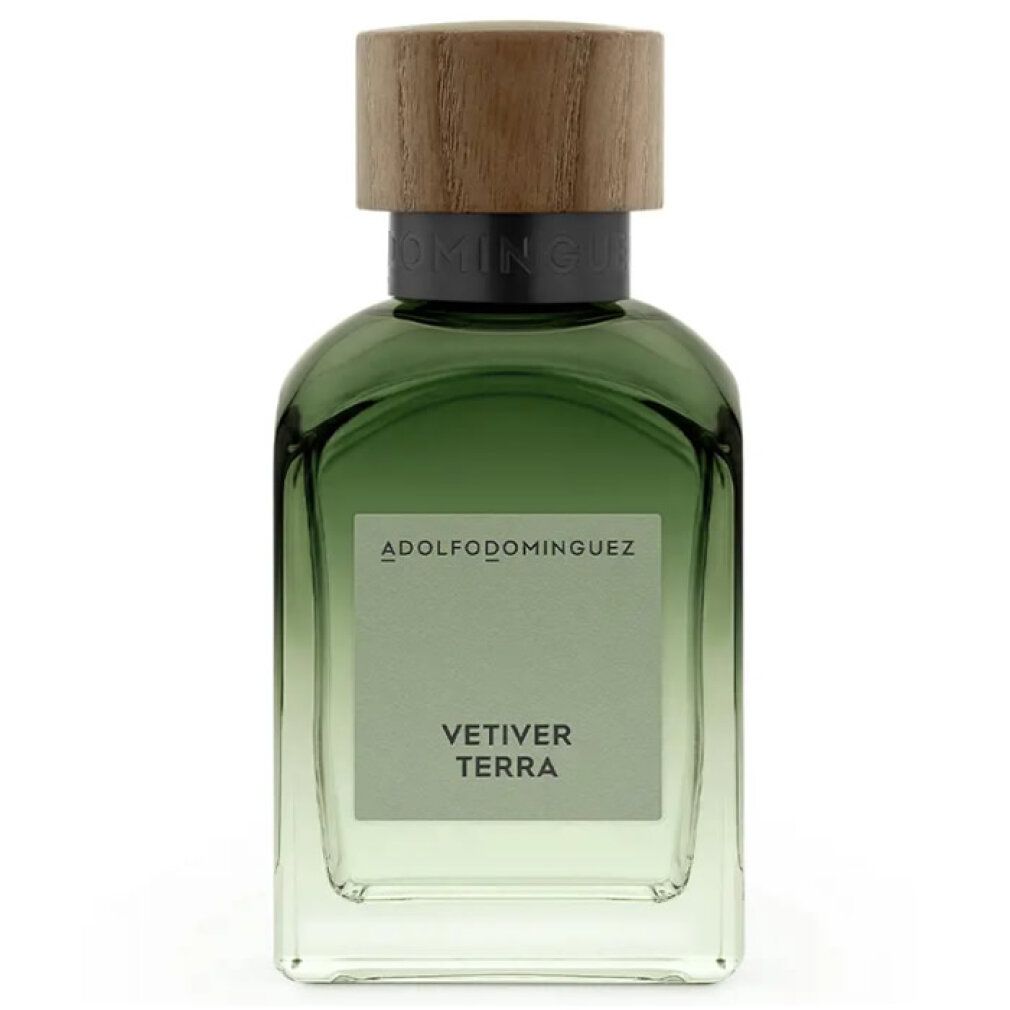 Grüne Glasflasche mit Holzdeckel. Aufschrift: ADOLFODOMINGUEZ, VETIVER TERRA. Eau de Parfum Spray.