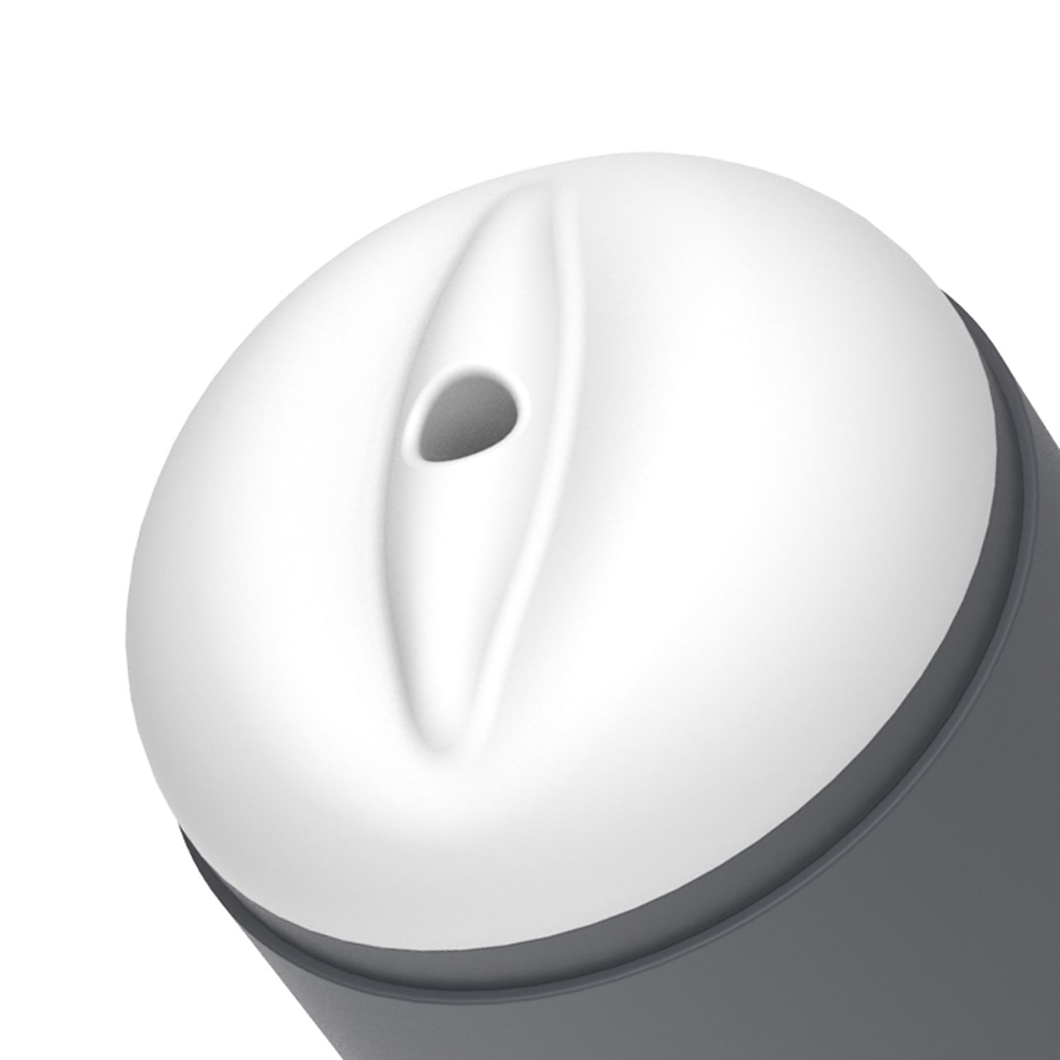 Nahaufnahme des weißen Einsatzes eines grauen, zylindrischen Produkts. Eine ovale Öffnung ist sichtbar.