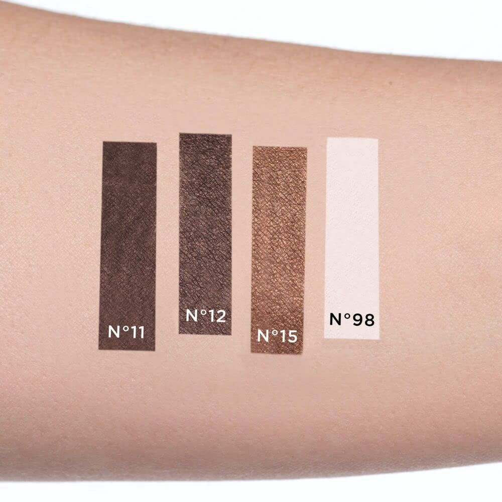 Arm mit vier Farbmustern. Von links nach rechts: N°11, N°12, N°15, N°98. Verschiedene Brauntöne und ein helles Beige.