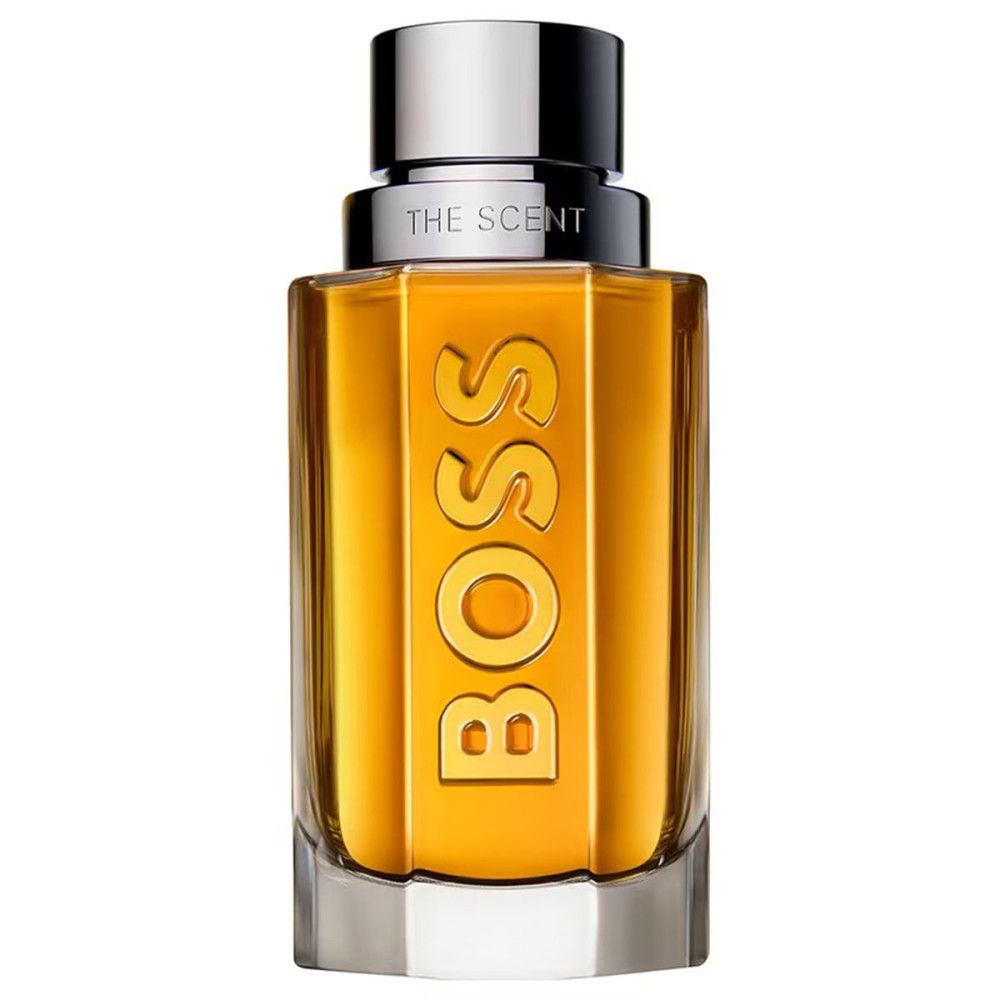 Flakon mit silbernem Deckel. Aufschrift BOSS und THE SCENT. Goldfarbene Flüssigkeit im Glas.