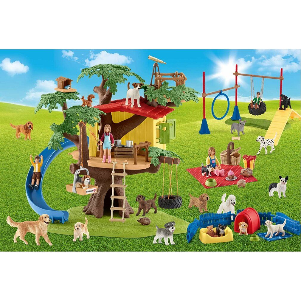 Szene mit Schleich Happy Dogs Spielzeug. Enthält Hunde, Baumhaus, Rutsche, Spielplatz, Picknick-Szene und Zubehör.