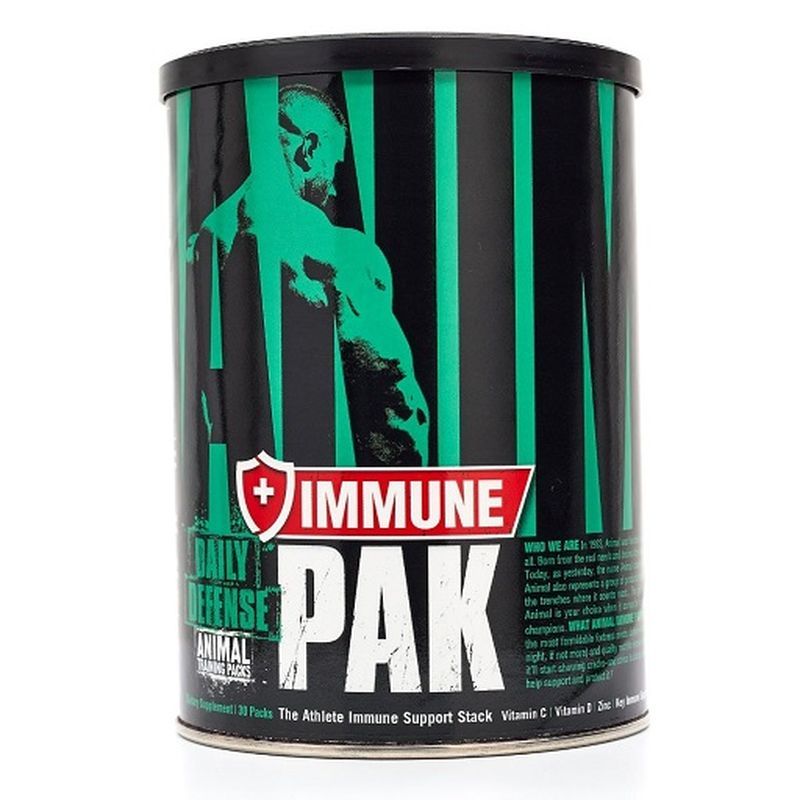 Zylindrische Dose mit "IMMUNE PAK"-Etikett. Schwarzer Hintergrund mit grünen Streifen und einem Mann. Rote und weiße Schrift.