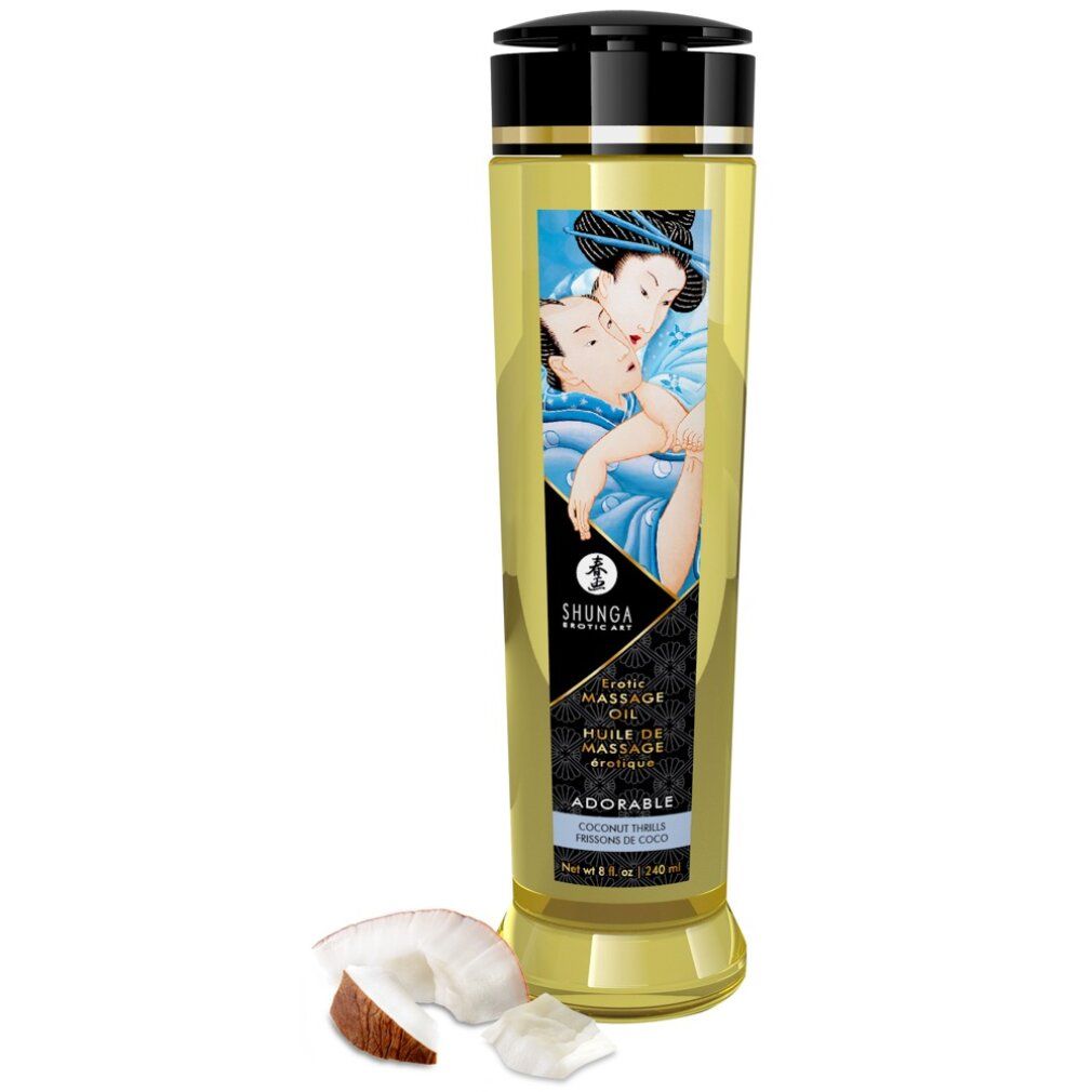 Zylindrische Flasche mit schwarzem Deckel. Etikett mit Abbildung und Text: Shunga, Erotic Massage Oil, Adorable. Kokosnuss daneben.