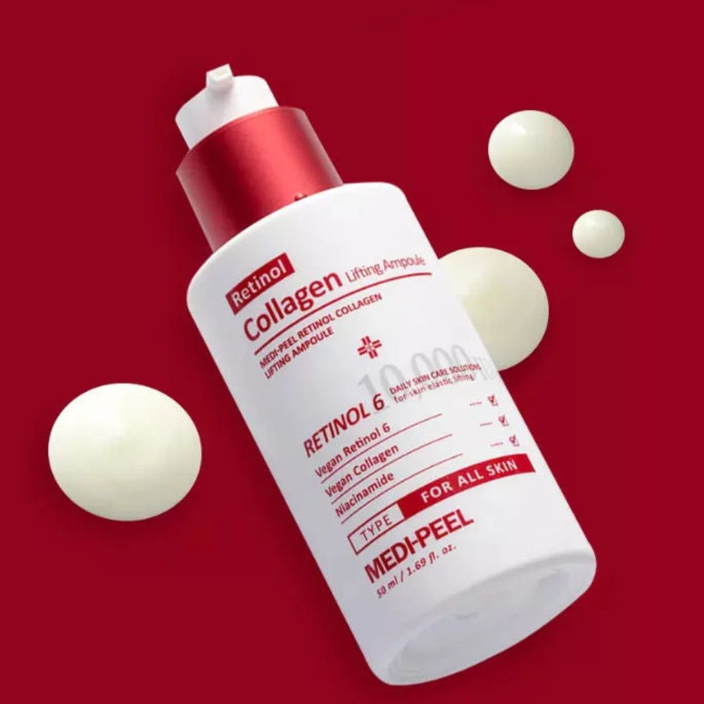 Weiße Flasche mit rotem Verschluss und weißen Kugeln. Beschriftung: Retinol Collagen Lifting Ampoule. Text: RETINOL 6, Vegan Retinol, Vegan Collagen, Niacinamide. Für alle Hauttypen.