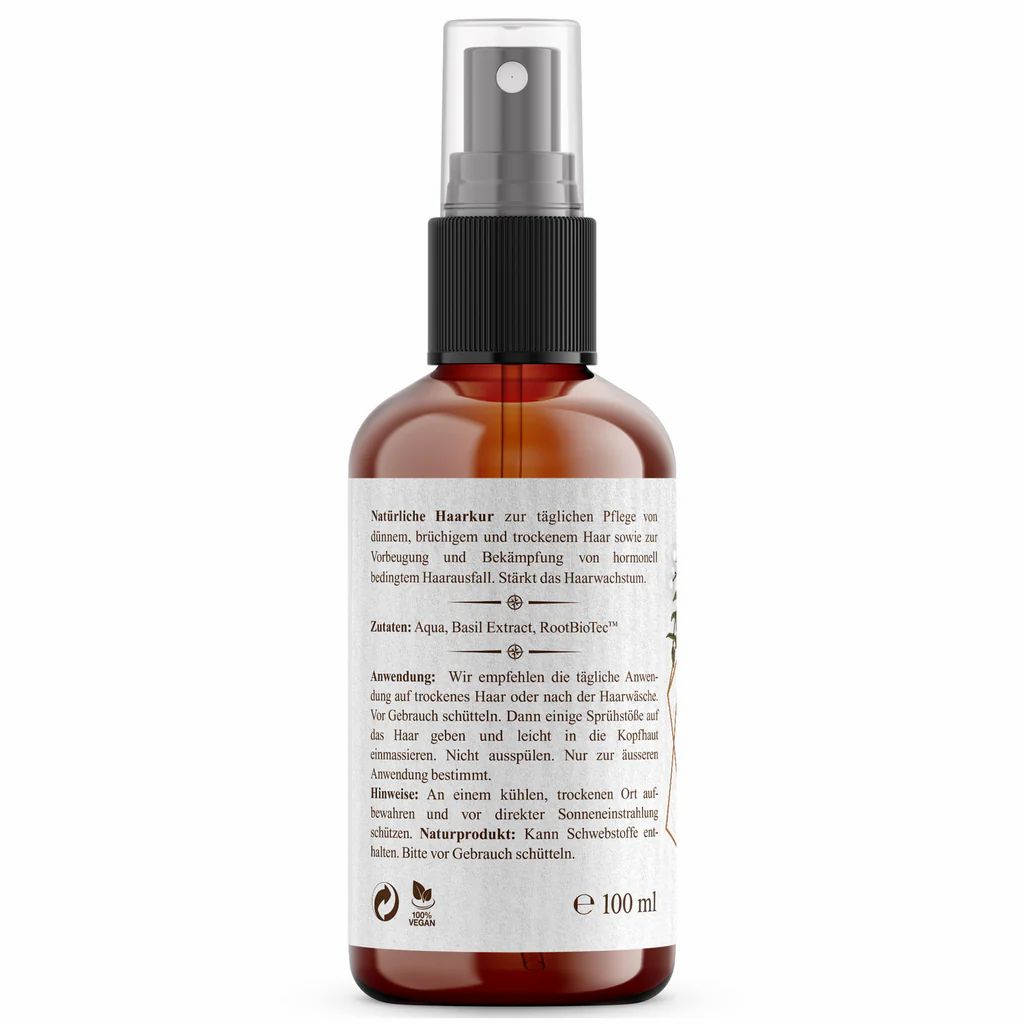 Rückseite einer braunen Sprühflasche. Text: Natürliche Haarkur, Inhaltsstoffe, Anwendung, Hinweise. Marke: Nordic Pure. Volumen: 100 ml. Vegan-Siegel.