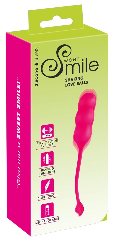 Rosa Vaginaltrainer in Verpackung. Marke Sweet Smile. Mit Gewichtsangabe und Piktogrammen für Funktionen. "Give me a SWEET SMILE!"