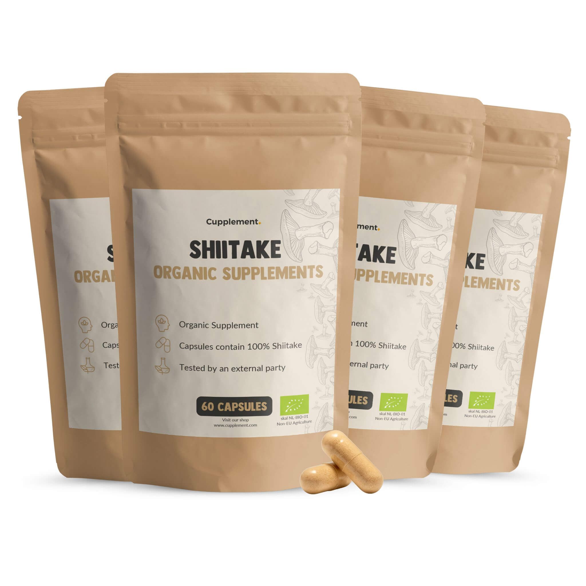 Mehrere Beutel mit Shiitake-Kapseln. Aufschrift: Shiitake Organic Supplements. 60 Kapseln. Zwei Kapseln liegen daneben.