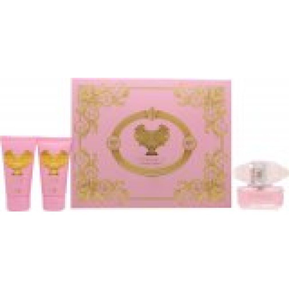 Geschenkset mit rosa Verpackung, zwei Tuben, einer Flasche und einem rosa Flakon. Goldene Verzierungen und Logo.