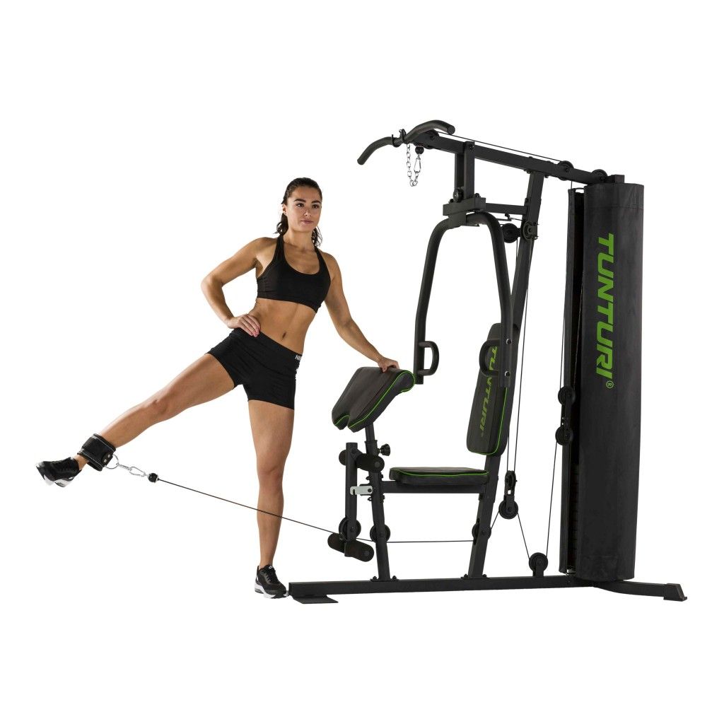 Tunturi Home Gym HG20: Frau mit Beinmanschette für Kabelzug-Übungen.