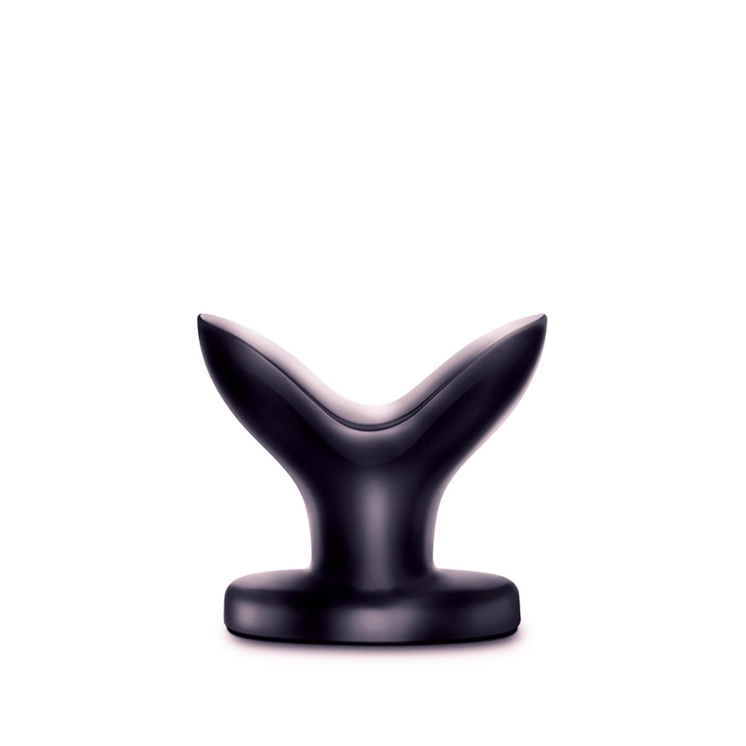 Schwarzes Wellness-Produkt. Basis, Schaft und oberer Teil mit zwei Flügeln. Glatte Oberfläche.