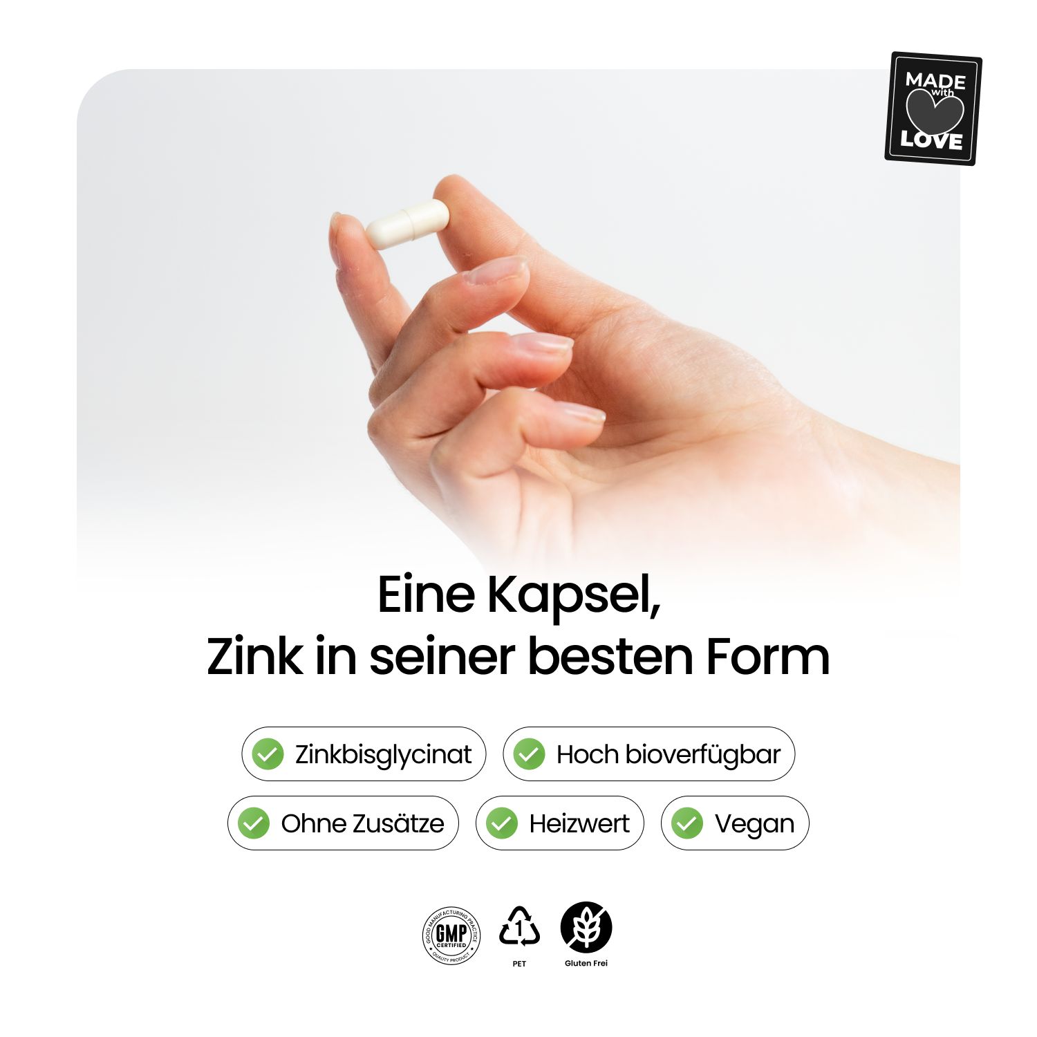 Hand hält eine Kapsel. Text: Eine Kapsel, Zink in bester Form. Logos: Zinkbisglycinat, hoch bioverfügbar, ohne Zusätze, vegan.