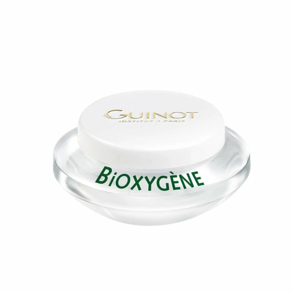 Guinot Bioxygene Creme in einem transparenten Behälter mit weißem Deckel.