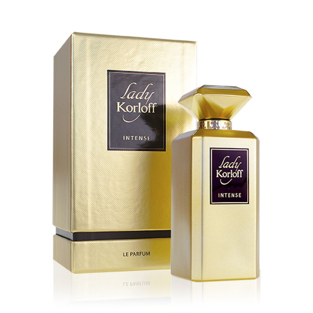 Goldfarbener Flakon und Box. Aufschrift: Lady Korloff Intense. Flakon mit Diamant-Deckel. Box mit schwarzem Label.