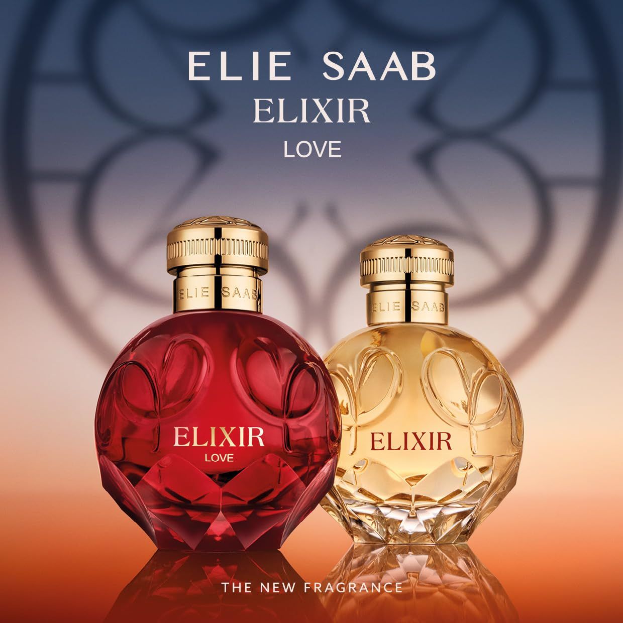 Zwei Elie Saab Elixir Flakons. Roter und goldfarbener Flakon mit goldenem Verschluss. Aufschrift "ELIXIR LOVE".