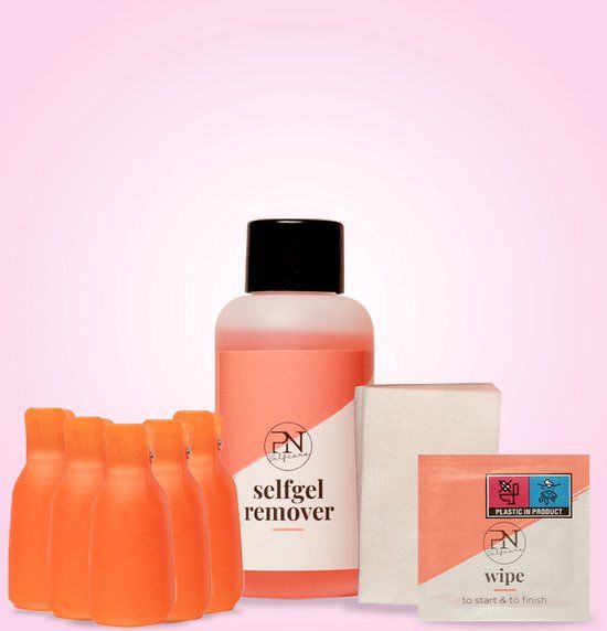 Flasche, Pads, Tücher und orangefarbene Clips. Aufschrift: selfgel remover und wipe. Rosa Hintergrund.