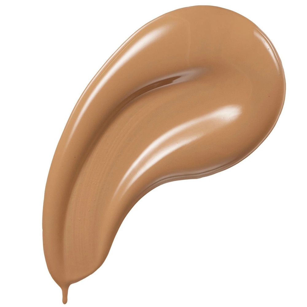 Swirl aus flüssiger Foundation. Farbton hellbraun. Glänzende Oberfläche.