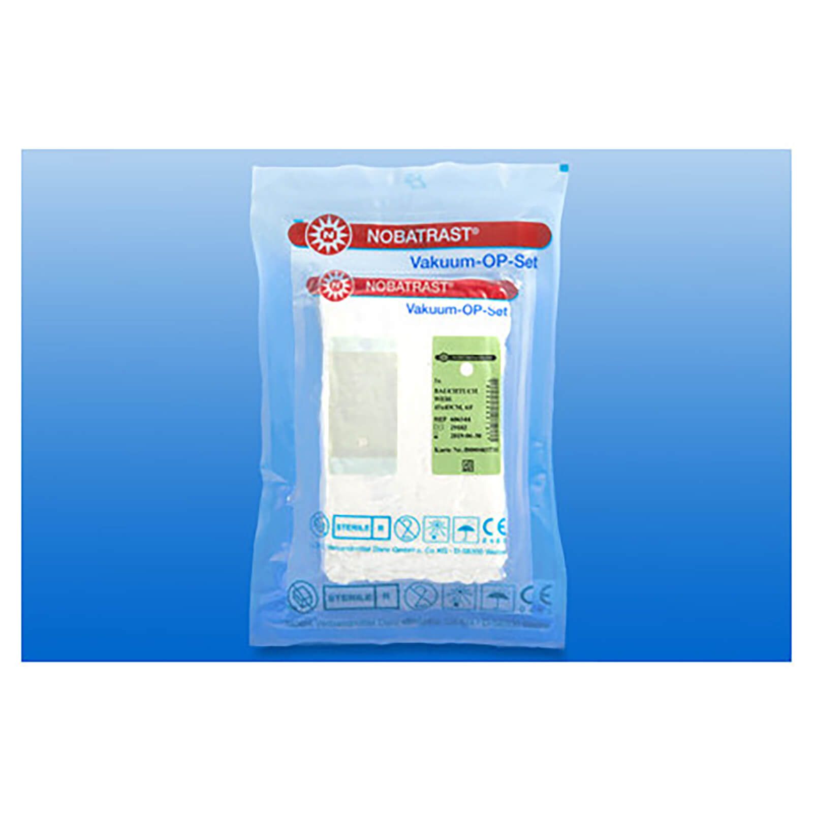 Verpackung mit OP-Set. Transparent, mit Produktbezeichnung und Logo. Enthält ein weißes Bauchtuch und weitere Komponenten.