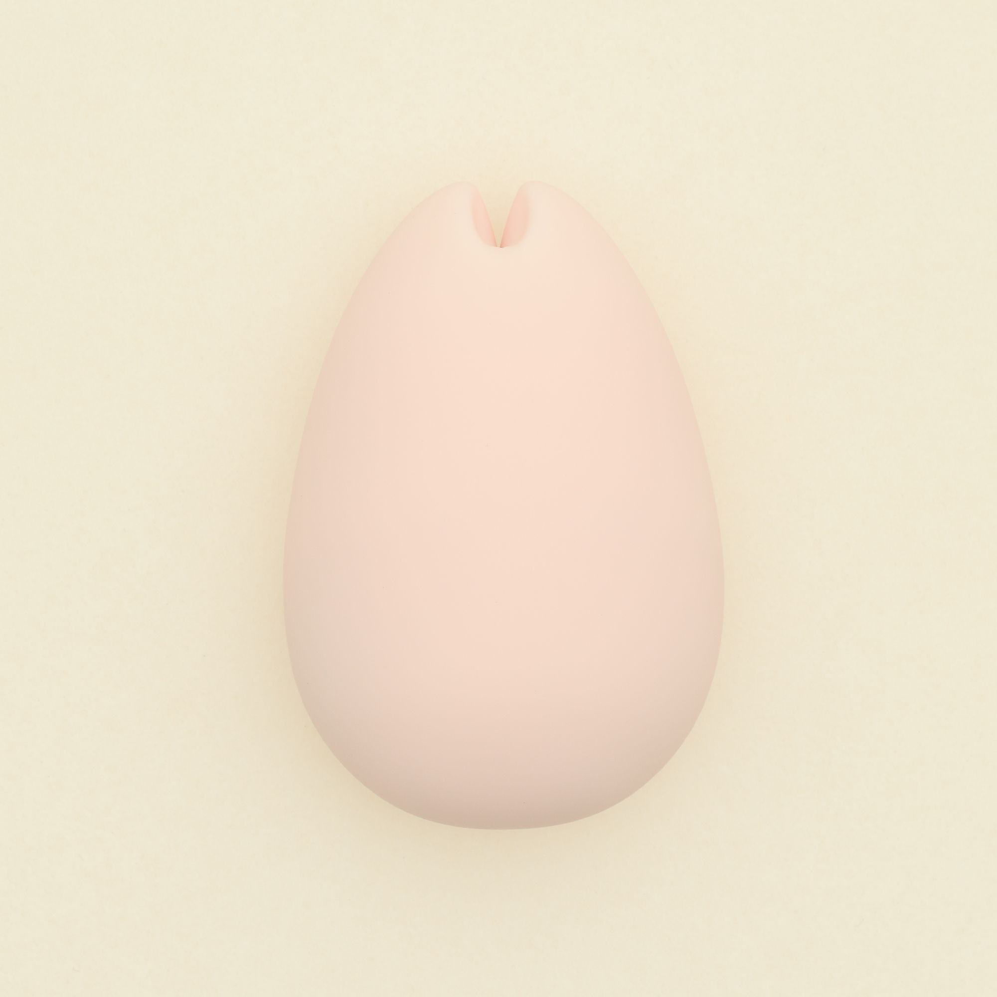 Rosa TENGA iroha SAKURA Vibrator. Eiförmig, mit einer Aussparung an der Spitze. Glatte Oberfläche.