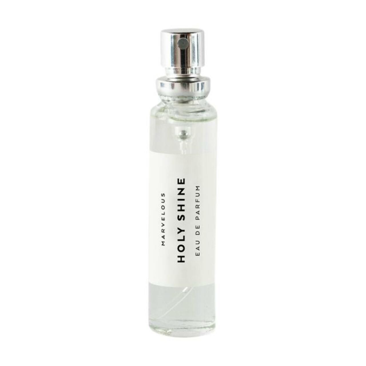 Parfümflakon mit silbernem Zerstäuber. Aufkleber mit "HOLY SHINE EAU DE PARFUM".