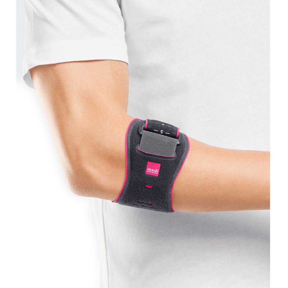 Ellenbogenbandage am Arm. Grau mit pinkfarbenen Akzenten. Marke Medi sichtbar.