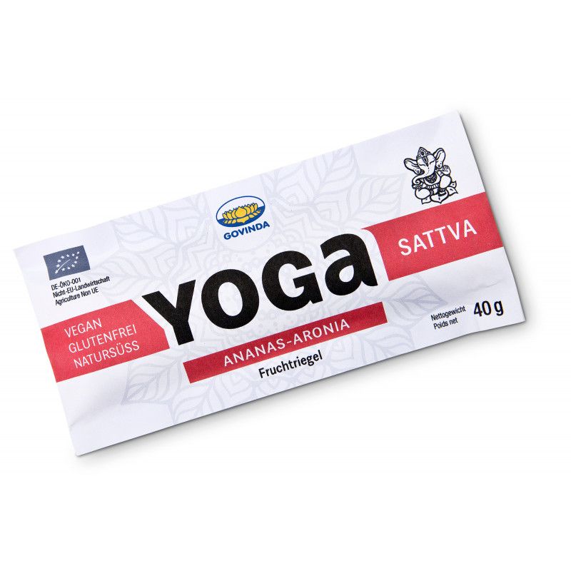 Verpackung eines Yoga-Riegels. Text: Yoga, Ananas-Aronia, Sattva, vegan, glutenfrei, natursüß. Logo: Govinda. EU-Bio-Siegel. Gewicht: 40g.