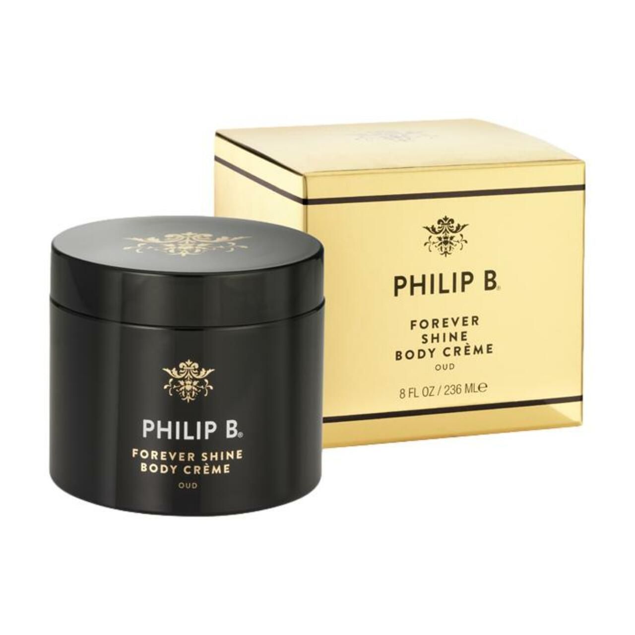 Schwarzer Tiegel und goldene Schachtel. Aufschrift: Philip B. Forever Shine Body Crème Oud.