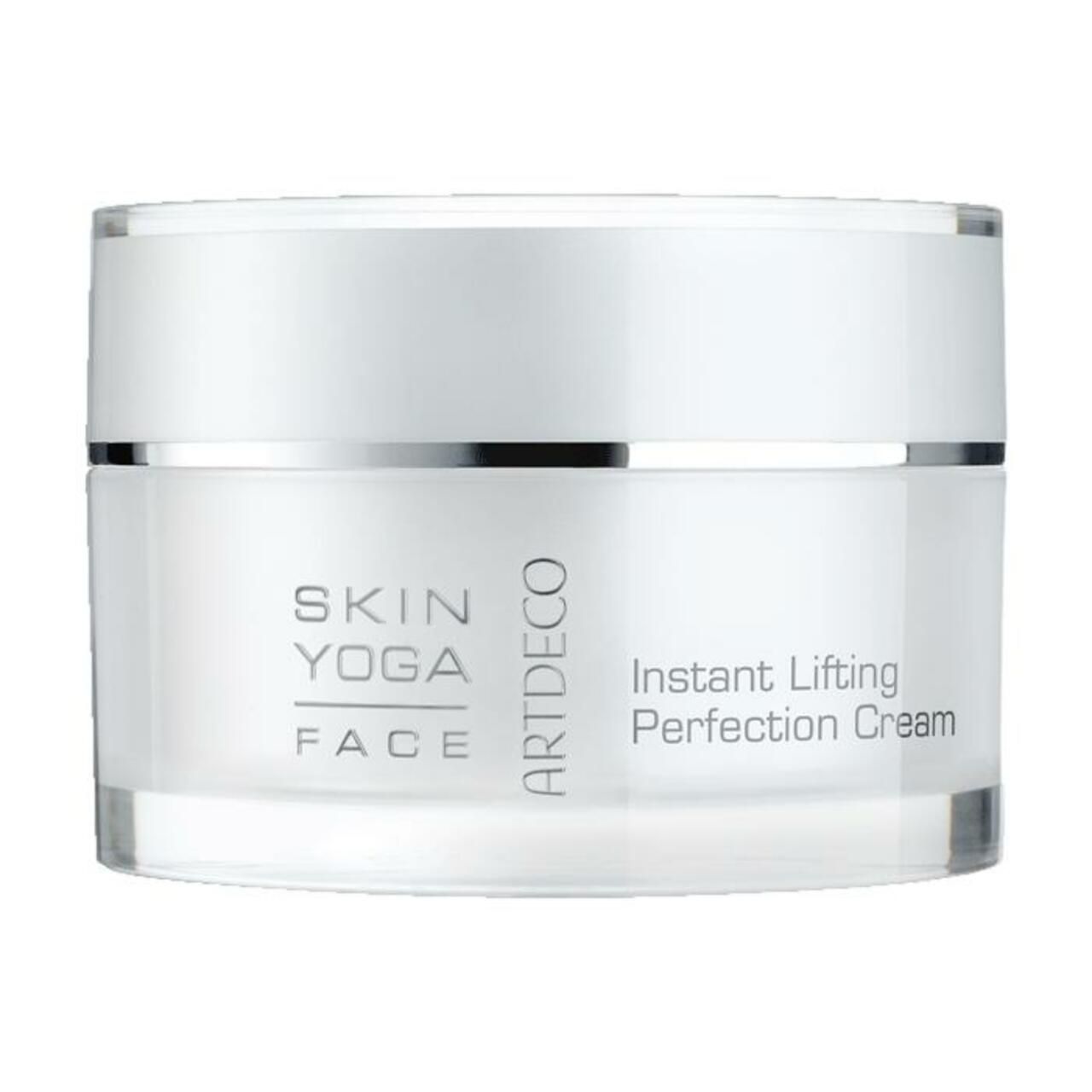 Creme-Tiegel mit weißem Deckel und transparentem Behälter. Aufschrift: Skin Yoga Face, Artdeco, Instant Lifting Perfection Cream.